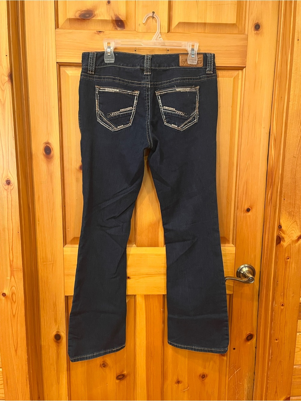 Boot Cut Women's Jeans in Dark Blue with Decorative Back Stitching